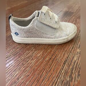 Toddler girl Sperry sneakers. Gold glittery shoe with easy to put on Velcro.
